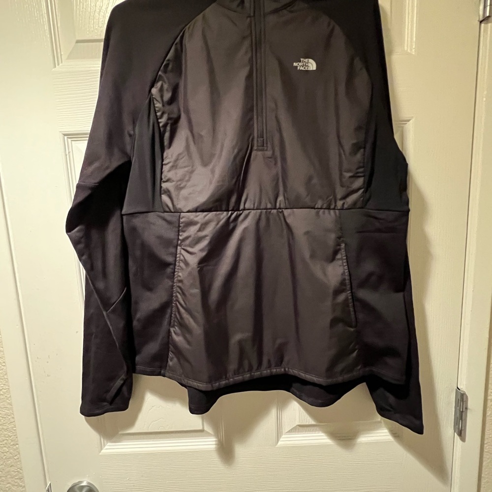 Black North-Face Pull Over Jacket. Great Condition.